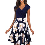 Load image into Gallery viewer, Short-sleeved dress with V-neck and floral print
