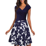 Load image into Gallery viewer, Short-sleeved dress with V-neck and floral print
