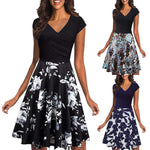 Load image into Gallery viewer, Short-sleeved dress with V-neck and floral print
